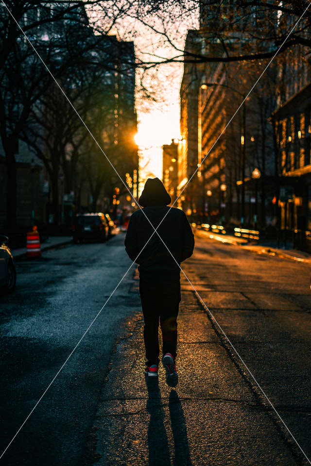 person walking on road